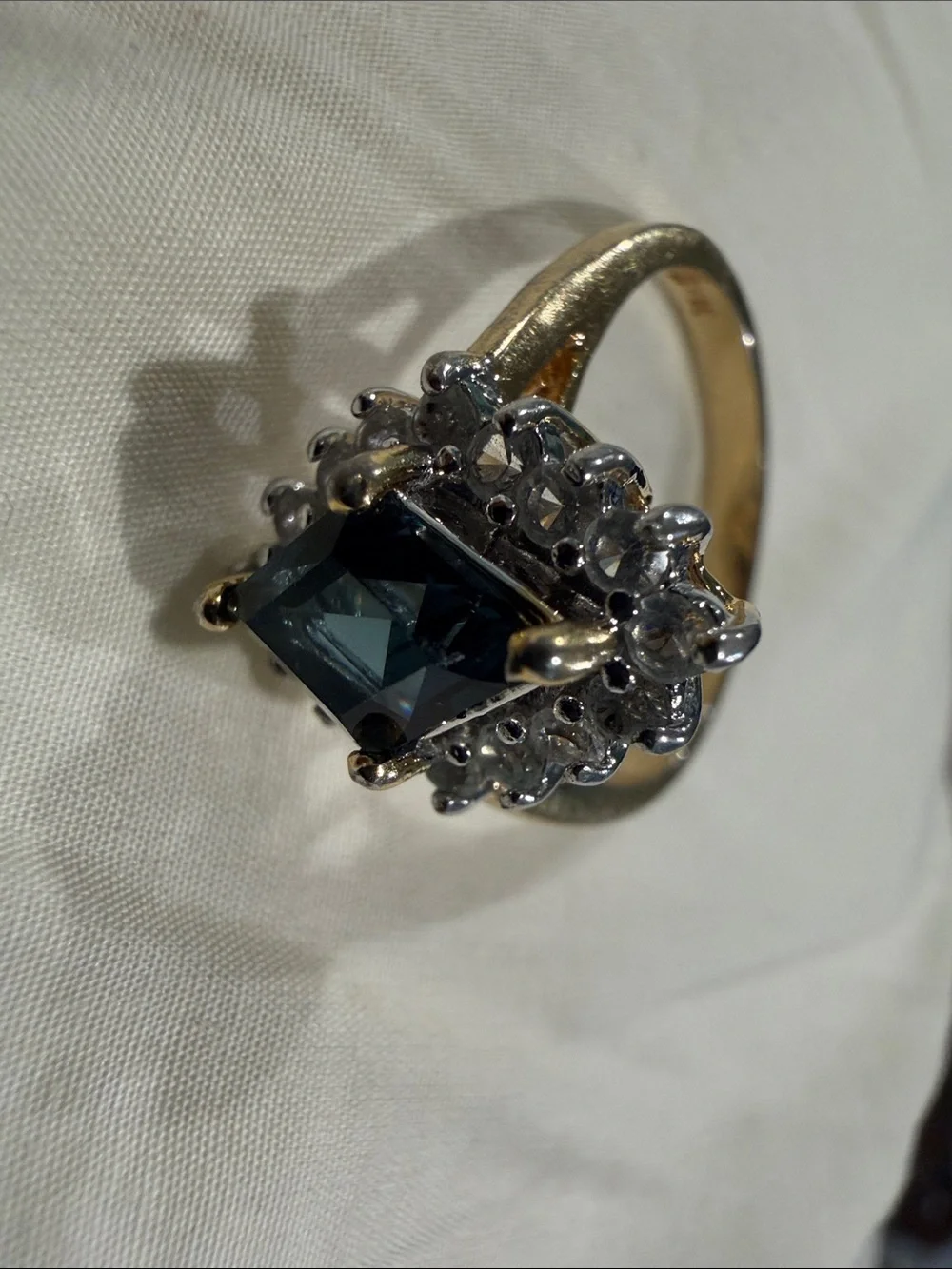 18K Gold Electroplated Ring with Deep Blue Kite-Cut Center and Clear Stones.